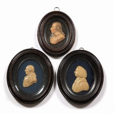 Lot 137 - A PAIR OF LATE 18TH CENTURY WAX RELIEF PORTRAIT MEDALLIONS