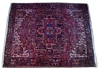 Lot 222 - A RED GROUND HERIZ CARPET