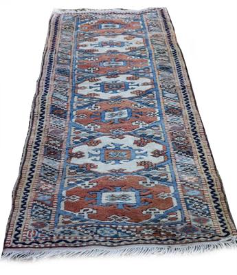 Lot 233 - AN ORIENTAL PINK AND CREAM GROUND RUNNER