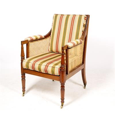 Lot 240 - A 19TH CENTURY BERGERE ARMCHAIR