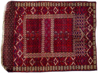 Lot 254 - AN ORIENTAL RED GROUND PRAYER MAT