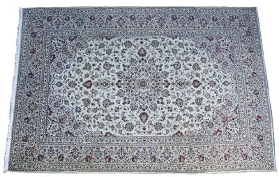 Lot 255 - A CREAM GROUND PERSIAN FLORAL CARPET