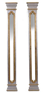 Lot 256 - A PAIR OF SILVER PAINTED AND PARCEL GILT ARCHITECTURAL MIRRORED PILASTERS