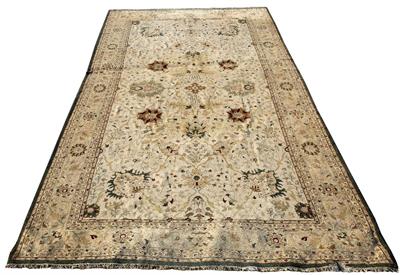 Lot 282 - A LARGE CREAM GROUND FLORAL CARPET