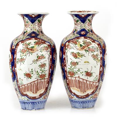 Lot 287 - A PAIR OF IMARI COLOURED PORCELAIN VASES