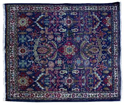 Lot 323 - A DARK BLUE GROUND RUG