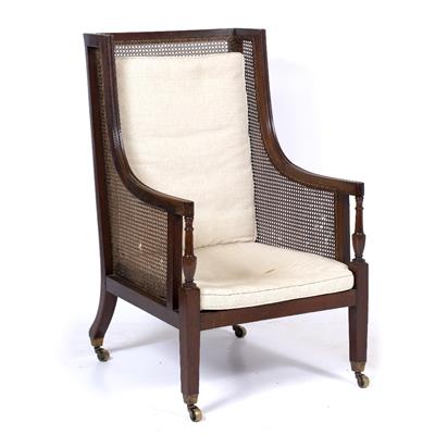 Lot 345 - A 19TH CENTURY MAHOGANY WING BACK BERGERE ARMCHAIR