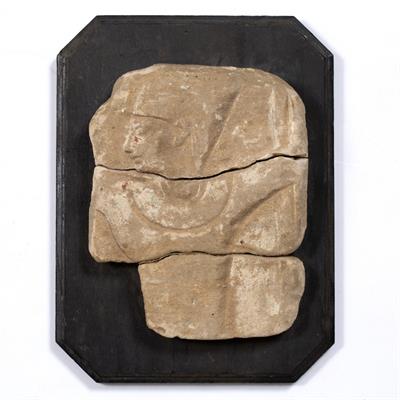 Lot 348 - A SMALL SANDSTONE CARVING IN THE EGYPTIAN MANNER