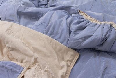 Lot 383 - A PAIR OF CREAM INTERLINED WATER SILK CURTAINS