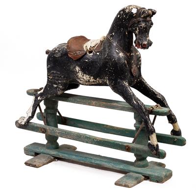 Lot 467 - A LATE 19TH / EARLY 20TH CENTURY PAINTED AND CARVED WOODEN ROCKING HORSE