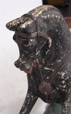 Lot 467 - A LATE 19TH / EARLY 20TH CENTURY PAINTED AND CARVED WOODEN ROCKING HORSE