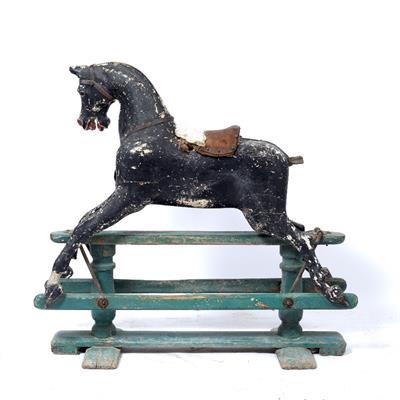 Lot 467 - A LATE 19TH / EARLY 20TH CENTURY PAINTED AND CARVED WOODEN ROCKING HORSE