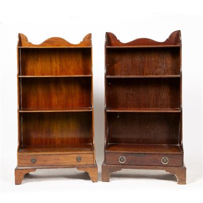 Lot 500 - TWO SIMILAR REGENCY STYLE MAHOGANY WATERFALL BOOKCASES