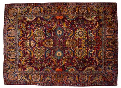 Lot 521 - AN ORIENTAL RED GROUND FLOWER DECORATED RUG