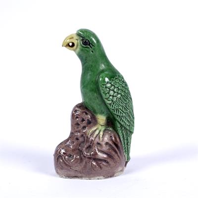 Lot 64 - Porcelain miniature model of a green glazed parrot