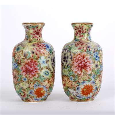 Lot 73 - Pair of miniature Mille fleurs decorated vases