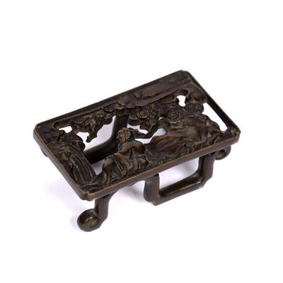 Lot 201 - Miniature bronze brush rest