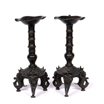 Lot 275 - Pair of bronze candlesticks