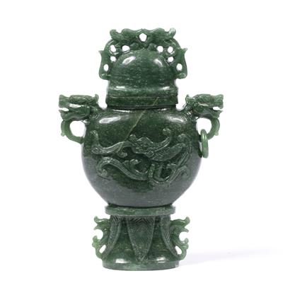 Lot 289 - Mottled green jade vase and cover