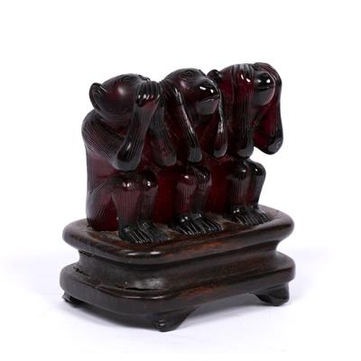 Lot 341 - Amber carving of three monkeys