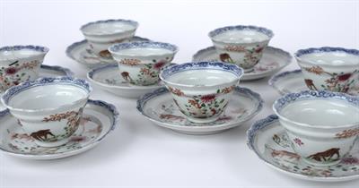 Lot 384 - Set of eight tea bowls and saucers