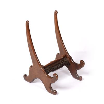 Lot 459 - Large carved wood charger stand