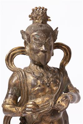 Lot 486 - Gilt bronze standing figure of  King Dhanada