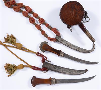 Lot 880 - Two white metal mounted jambiya with rhinoceros horn hilt