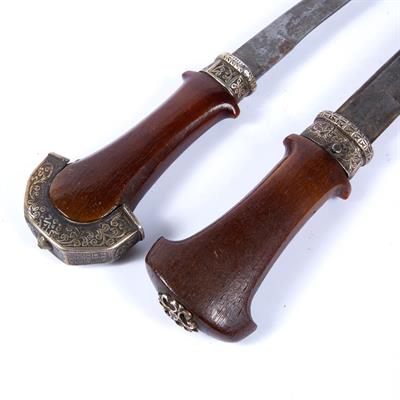 Lot 880 - Two white metal mounted jambiya with rhinoceros horn hilt