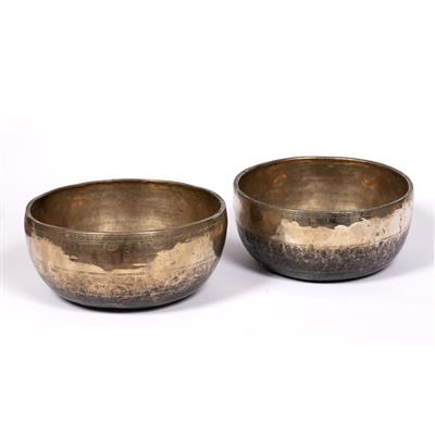 Lot 884 - Two singing bowls