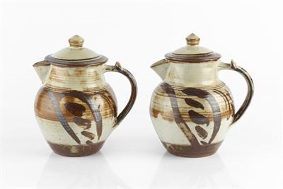 Lot 24 - Seth Cardew (1934-2016) at Wenford Bridge
Two coffee pots
with brushwork decoration over oatmeal...