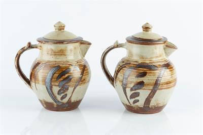 Lot 24 - Seth Cardew (1934-2016) at Wenford Bridge
Two coffee pots
with brushwork decoration over oatmeal...