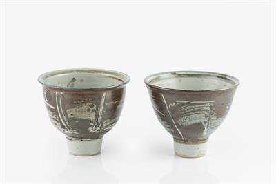 Lot 39 - Michael Casson (1925-2003)
Two bowls
with blue and brown brushed design over a cream ground
one...