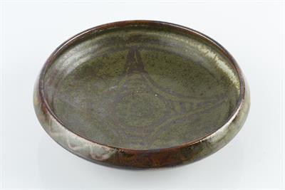 Lot 43 - Ladi Kwali (1925-1984) at Abuja Pottery 
Shallow bowl
green glaze