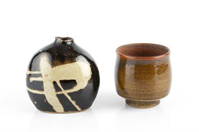 Lot 86 - Alan Brough (20th Century)
Yunomi and a bud vase
tenmoku 
impressed potter's seals
8