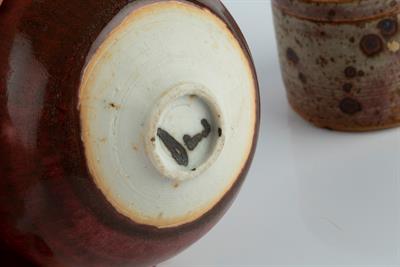 Lot 114 - Derek Davis (1926-2008)
Vase, and a box and cover
red glazes
both signed
9cm and 4