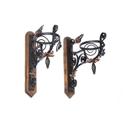 Lot 230 - Arts & Crafts
A pair of wall brackets
painted cast iron and copper
with later wooden...