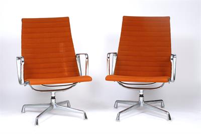 Lot 265 - Charles Eames (1907-1978) for Vitra 
A pair of EA 108 swivel chairs
aluminium base and orange...