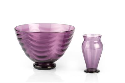 Lot 324 - Whitefriars
Bowl and vase
amethyst coloured glass
bowl 26cm diameter, vase 15