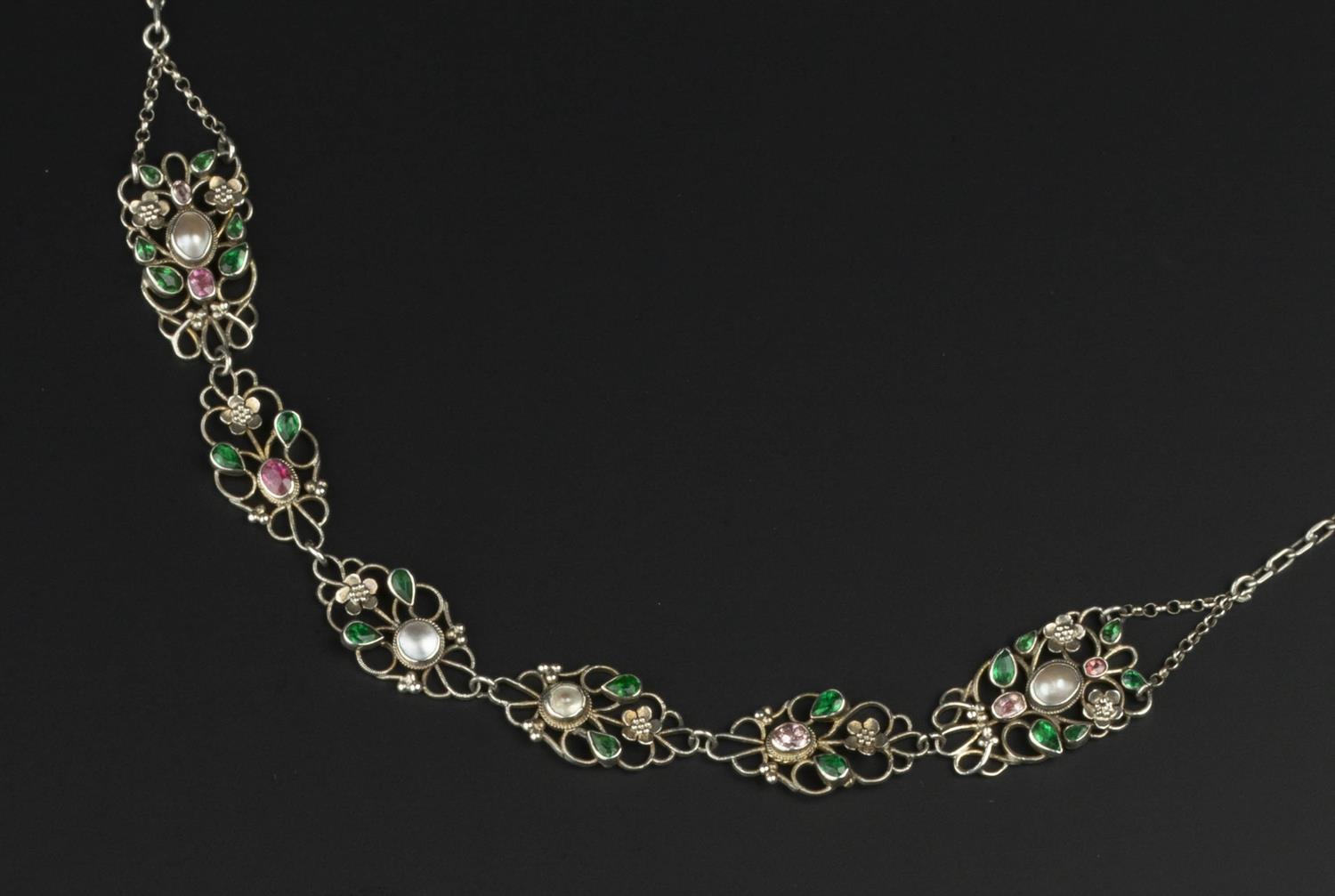 Lot 365 - Attributed to Arthur & Georgie Gaskin
Silver and gem set pendant necklace
designed as a series of...