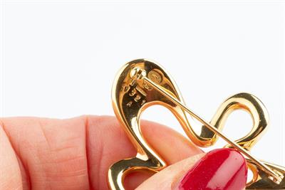 Lot 377 - Henning Koppel (1918 - 1981) for Georg Jensen
'Splash' brooch
signed and stamped '750...
