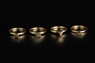 Lot 384 - Wendy Ramshaw (1939 - 2018)
Four 9ct gold stacking rings
applied with geometric panels
signed