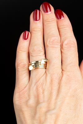 Lot 384 - Wendy Ramshaw (1939 - 2018)
Four 9ct gold stacking rings
applied with geometric panels
signed