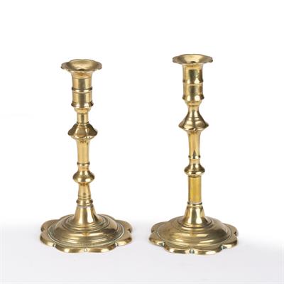 Lot 71 - Near pair of brass candlesticks (slight differences)