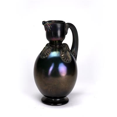 Lot 243 - Iridescent glass jug