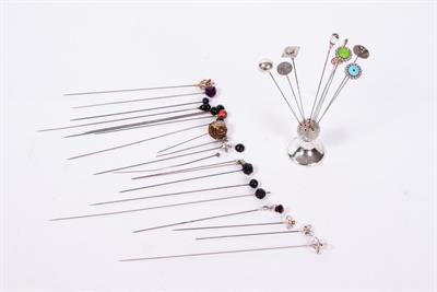 Lot 49 - A COLLECTION OF HAT PINS