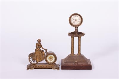 Lot 59 - AN EDWARDIAN PARCEL GILT AND CAST BRASS NOVELTY MANTLE TIMEPIECE OR CLOCK