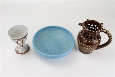 Lot 136 - A SLIPWARE PUZZLE JUG