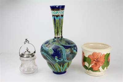 Lot 160 - A MOORCROFT CREAM GROUND HIBISCUS PATTERN POTTERY JARDINIERE