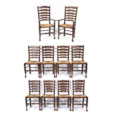 Lot 221 - A SET OF TEN OAK AND ASH LADDER BACK DINING CHAIRS